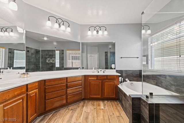 7252 Royal Melbourne Dr, Las Vegas, NV 89131 - bathroom with double vanity, a shower stall, and a garden tub