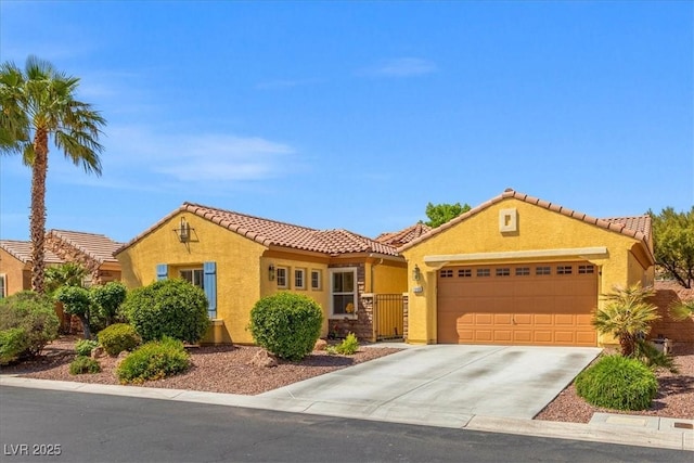7252 Royal Melbourne Dr, Las Vegas, NV 89131 - view of front of home featuring an attached garage, stucco siding, driveway, and a tile roof