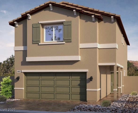 1421 Gable Falls Pl Unit 92, North Las Vegas, NV 89084 - view of front of house with stucco siding, an attached garage, and asphalt driveway