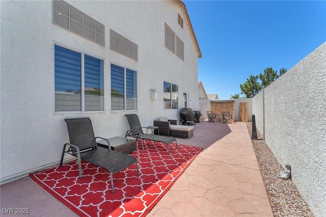 690 Great Dane Ct, Henderson, NV 89052 - fenced backyard featuring a patio