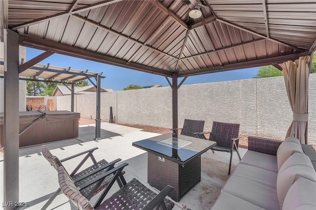 690 Great Dane Ct, Henderson, NV 89052 - fenced backyard featuring a hot tub, an outdoor hangout area, a patio, a pergola, and a gazebo