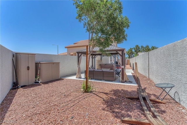 690 Great Dane Ct, Henderson, NV 89052 - fenced backyard featuring an outdoor living space, a gazebo, and a patio