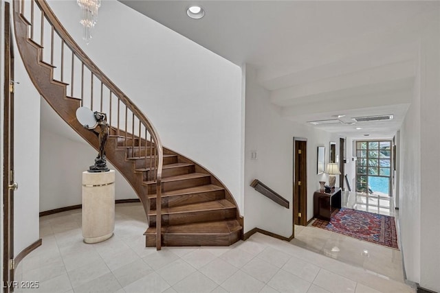 2925 Coast Line Ct, Las Vegas, NV 89117 - staircase featuring baseboards, tile patterned floors, and recessed lighting