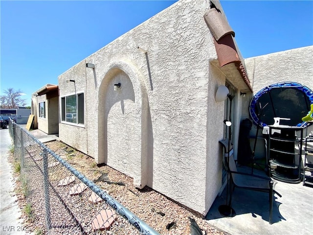 5305 W Cheyenne Ave, Las Vegas, NV 89108 - view of home's exterior featuring stucco siding