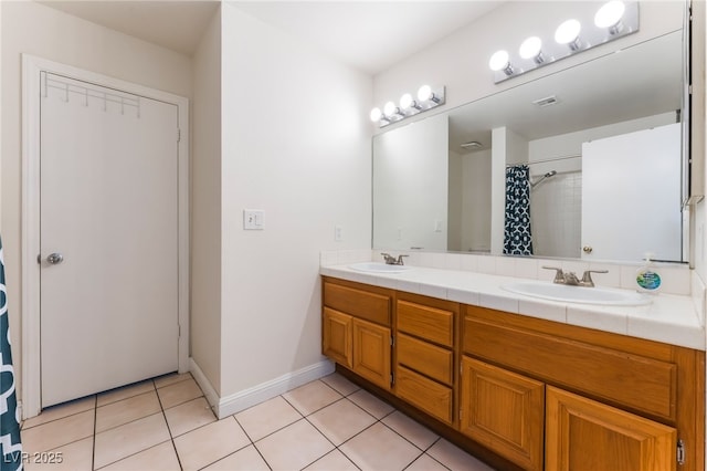 4335 Twin Peaks Dr, North Las Vegas, NV 89032 - full bath featuring double vanity, tile patterned floors, and curtained shower