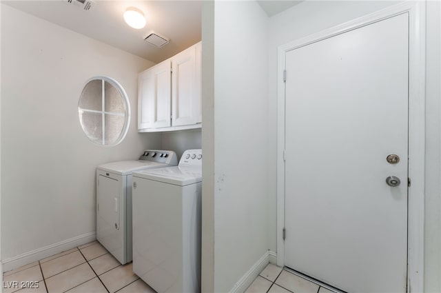 4335 Twin Peaks Dr, North Las Vegas, NV 89032 - washroom featuring independent washer and dryer, cabinet space, and light tile patterned flooring