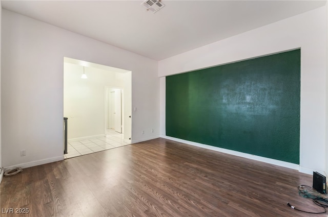 4335 Twin Peaks Dr, North Las Vegas, NV 89032 - empty room featuring wood finished floors and baseboards