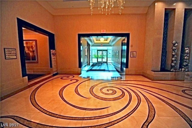 125 E Harmon Ave Unit 1918, Las Vegas, NV 89109 - hall featuring inlaid floor details and crown molding