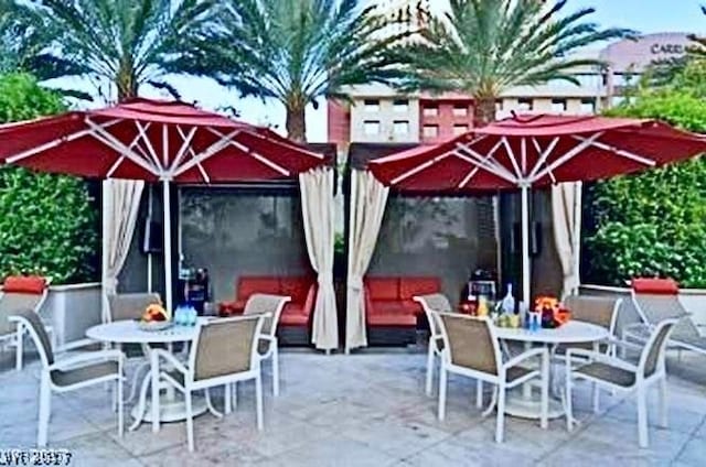 125 E Harmon Ave Unit 1918, Las Vegas, NV 89109 - view of patio featuring outdoor dining area