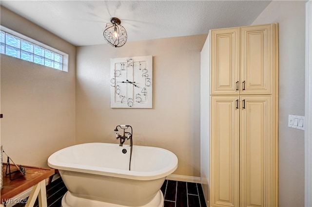 6821 Jeanette St, Las Vegas, NV 89131 - full bath with a freestanding bath, baseboards, and wood finished floors