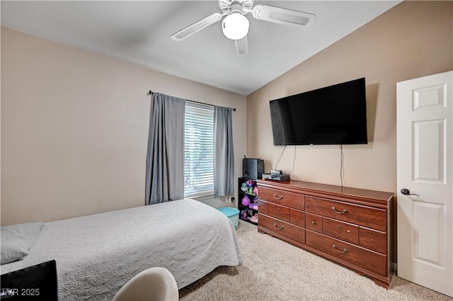 6821 Jeanette St, Las Vegas, NV 89131 - carpeted bedroom featuring vaulted ceiling and a ceiling fan