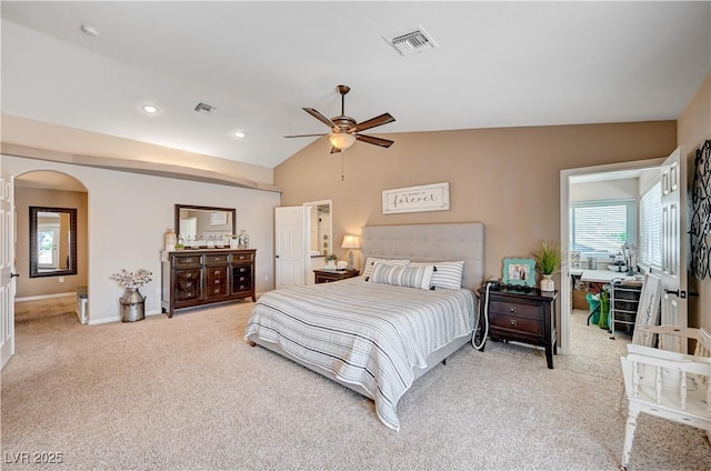 6821 Jeanette St, Las Vegas, NV 89131 - bedroom with arched walkways, carpet floors, multiple windows, lofted ceiling, and baseboards