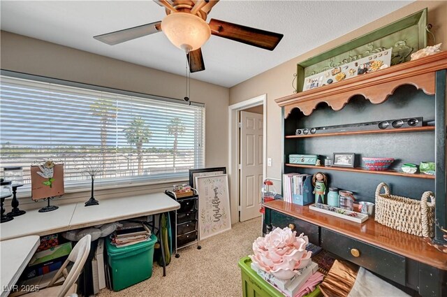 6821 Jeanette St, Las Vegas, NV 89131 - home office featuring carpet floors and a ceiling fan