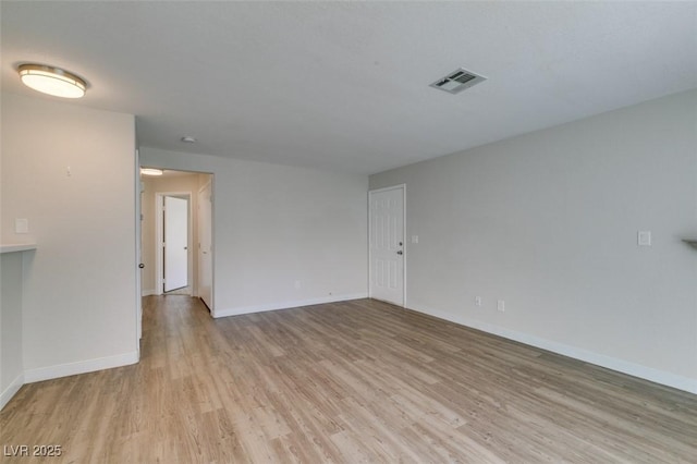 350 S Durango Dr Unit 103, Las Vegas, NV 89145 - empty room with light wood finished floors and baseboards