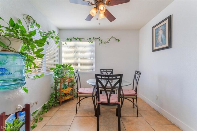 1812 N Decatur Blvd Unit 103, Las Vegas, NV 89108 - dining room with a ceiling fan and light tile patterned floors