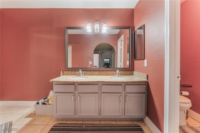 1812 N Decatur Blvd Unit 103, Las Vegas, NV 89108 - full bathroom with double vanity and tile patterned flooring
