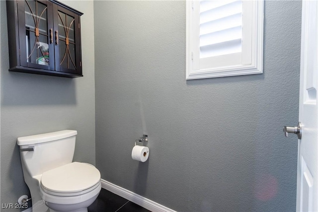 10526 Harvest Wind Dr, Las Vegas, NV 89135 - bathroom featuring toilet and baseboards