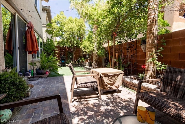 10526 Harvest Wind Dr, Las Vegas, NV 89135 - fenced backyard featuring a patio