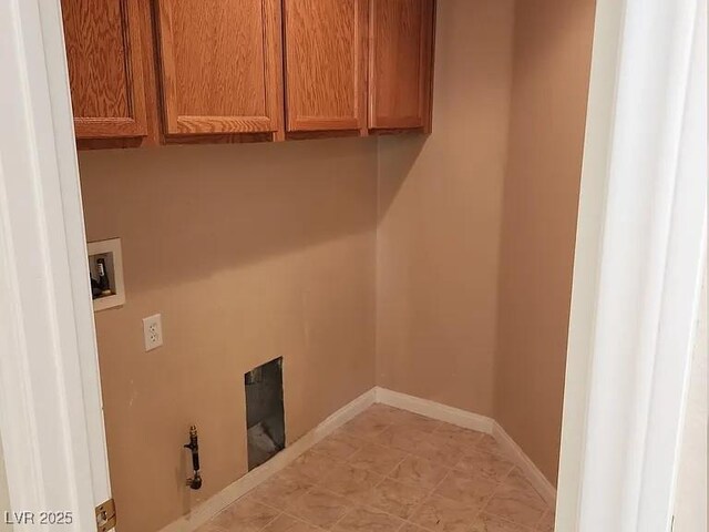 5605 Midnight Breeze St, North Las Vegas, NV 89081 - washroom with hookup for a washing machine and cabinet space