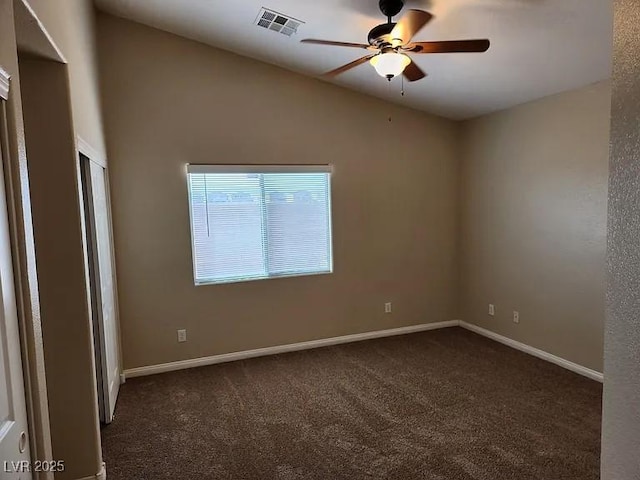 5605 Midnight Breeze St, North Las Vegas, NV 89081 - unfurnished room with dark carpet, ceiling fan, and vaulted ceiling