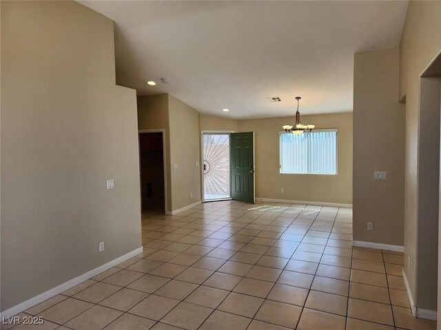 5605 Midnight Breeze St, North Las Vegas, NV 89081 - unfurnished room featuring a chandelier, recessed lighting, and light tile patterned flooring