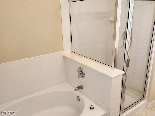 5605 Midnight Breeze St, North Las Vegas, NV 89081 - bathroom with a shower stall and a garden tub