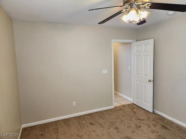 5605 Midnight Breeze St, North Las Vegas, NV 89081 - empty room featuring ceiling fan, light colored carpet, and a smoke detector