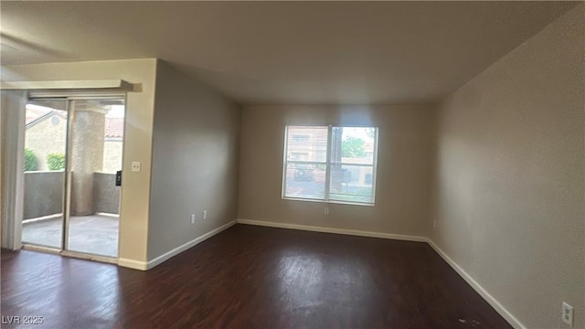 2300 E Silverado Ranch Blvd Unit 1104, Las Vegas, NV 89183 - unfurnished room with wood finished floors and baseboards