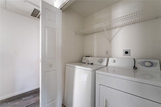 1838 N Jones Blvd, Las Vegas, NV 89108 - laundry area featuring wood finished floors, washer and dryer, and baseboards