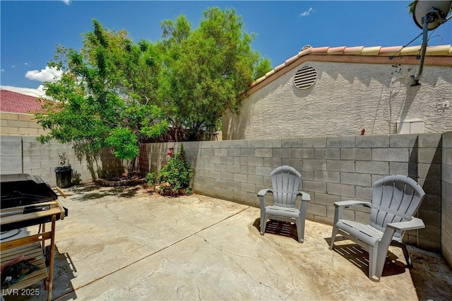7616 Yondering Ave, Las Vegas, NV 89131 - fenced backyard featuring a patio