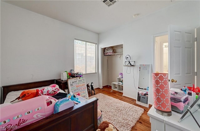 7616 Yondering Ave, Las Vegas, NV 89131 - bedroom featuring light wood-style floors and a closet