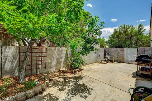 7616 Yondering Ave, Las Vegas, NV 89131 - fenced backyard with a patio