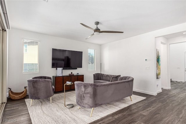 12332 Switchgrass Ave, Las Vegas, NV 89138 - living room featuring dark wood-type flooring, plenty of natural light, and a ceiling fan