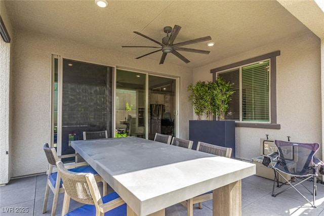 12332 Switchgrass Ave, Las Vegas, NV 89138 - view of patio featuring ceiling fan and outdoor dining space