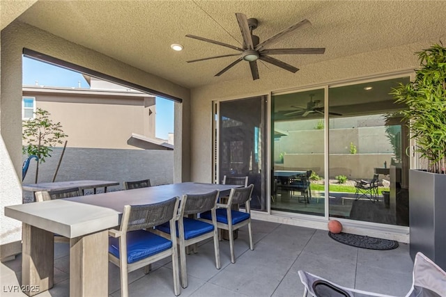 12332 Switchgrass Ave, Las Vegas, NV 89138 - view of patio / terrace featuring a ceiling fan and outdoor dining area