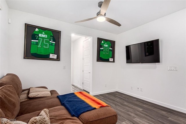 12332 Switchgrass Ave, Las Vegas, NV 89138 - living area featuring dark wood-style floors, baseboards, and a ceiling fan
