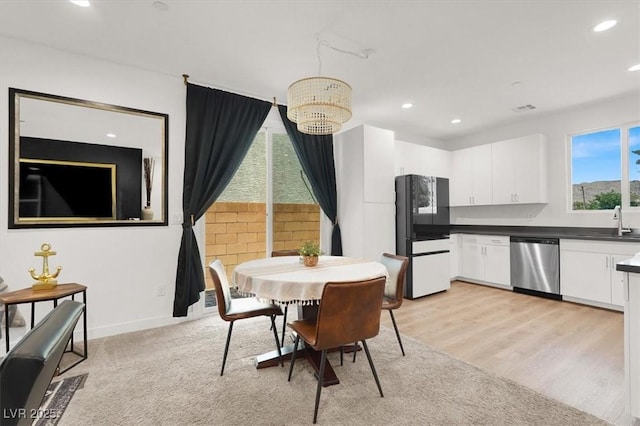 66 Chelsea Manor Ct, Las Vegas, NV 89110 - dining space featuring recessed lighting, light wood finished floors, and baseboards