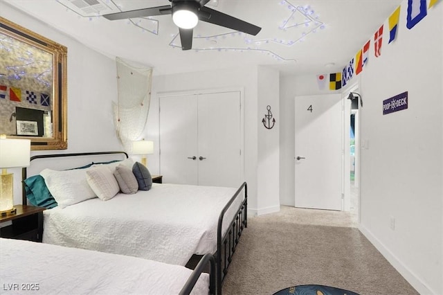 66 Chelsea Manor Ct, Las Vegas, NV 89110 - bedroom featuring carpet flooring, a closet, baseboards, and a ceiling fan