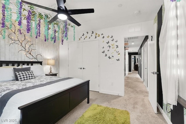 66 Chelsea Manor Ct, Las Vegas, NV 89110 - bedroom with light colored carpet, a closet, a ceiling fan, and baseboards