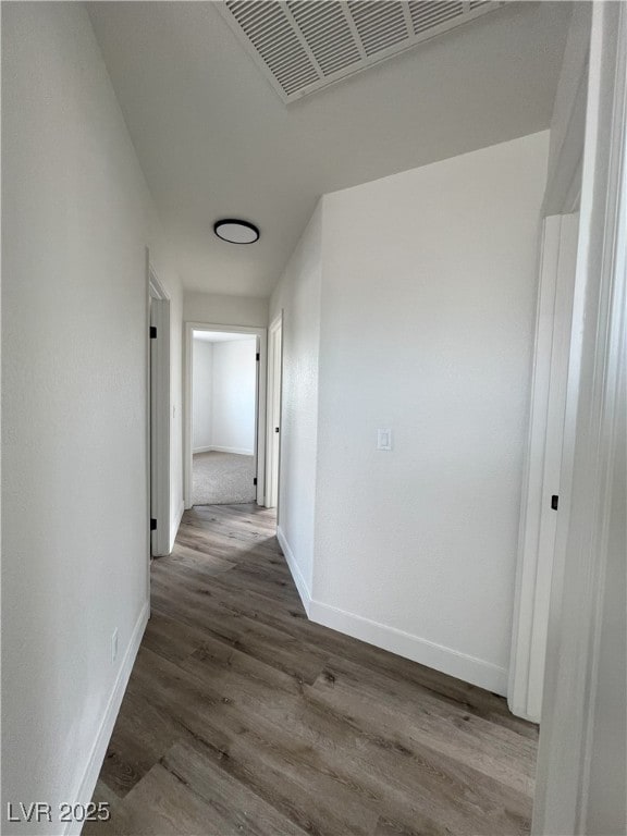 8068 Cetus Cir, Las Vegas, NV 89128 - hall featuring baseboards and wood finished floors