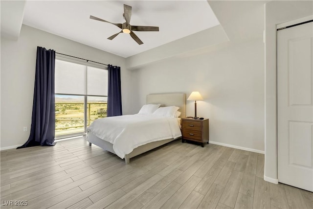 8255 Las Vegas Blvd Unit 1821, Las Vegas, NV 89123 - bedroom with light wood-type flooring, baseboards, and a ceiling fan