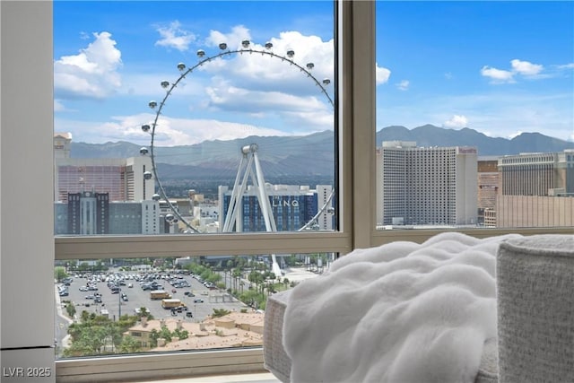 1 Hughes Center Dr Unit 1901, Las Vegas, NV 89169 - bedroom with a mountain view and a city view