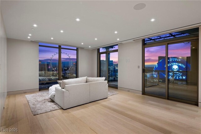 1 Hughes Center Dr Unit 1901, Las Vegas, NV 89169 - living area featuring a wall of windows, light wood-style flooring, recessed lighting, and a view of city