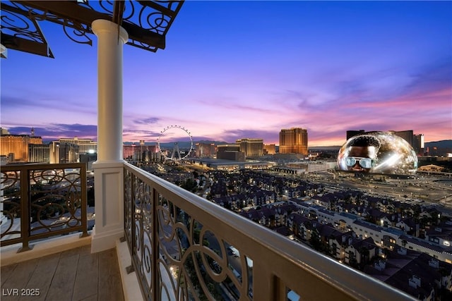 1 Hughes Center Dr Unit 1901, Las Vegas, NV 89169 - balcony at dusk featuring a city view