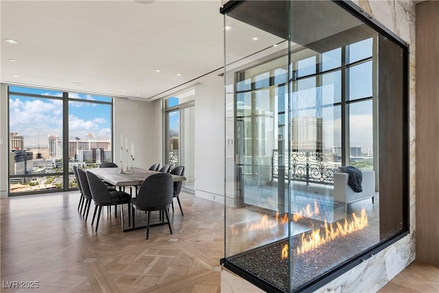 1 Hughes Center Dr Unit 1901, Las Vegas, NV 89169 - dining room featuring floor to ceiling windows, a city view, and recessed lighting