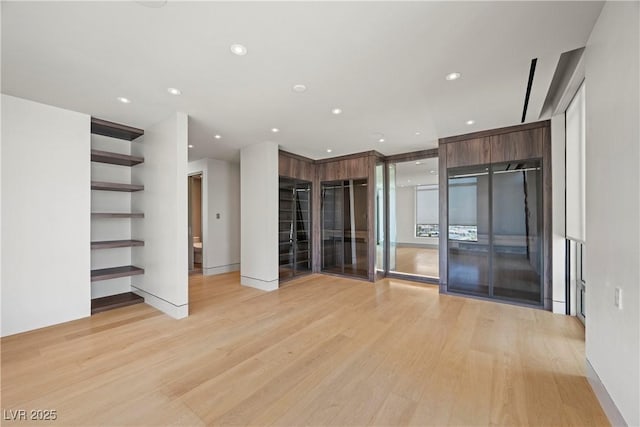 1 Hughes Center Dr Unit 1901, Las Vegas, NV 89169 - unfurnished room with light wood-style flooring and recessed lighting