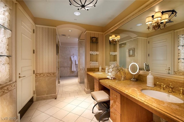 1 Hughes Center Dr Unit 1901, Las Vegas, NV 89169 - bathroom featuring a chandelier, tile patterned floors, a shower stall, and vanity