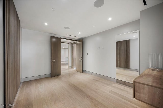1 Hughes Center Dr Unit 1901, Las Vegas, NV 89169 - spare room featuring light wood-type flooring, recessed lighting, and baseboards