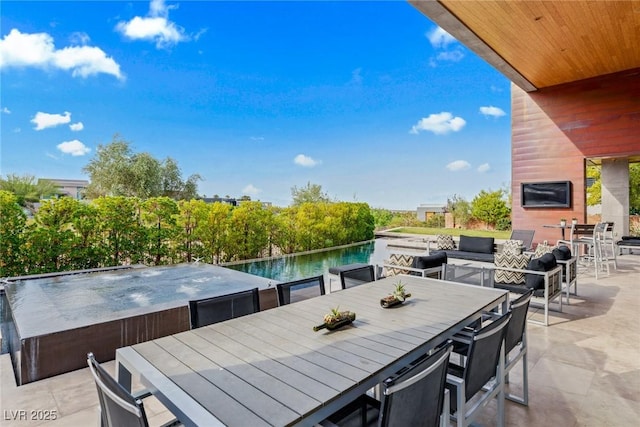 8 Meadowhawk Ln, Las Vegas, NV 89135 - view of patio / terrace featuring outdoor dining area and an outdoor living space