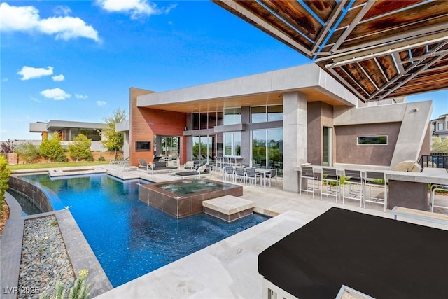 8 Meadowhawk Ln, Las Vegas, NV 89135 - view of swimming pool featuring a patio area and a pool with connected hot tub
